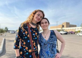 A wedding photograph of Autumn Hill and Meagan Morris.