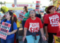 Employees protest for a higher minimum wage outside of a McDonald's in Las Vegas, Nevada, on May 24, 2017.