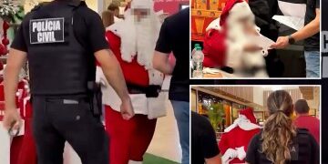 Momento en que policías armados derriban la puerta del apartamento de la 'red de paedo satánico' mientras cuatro son acusados ​​de crímenes horribles