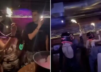 Un vídeo espeluznante de un bar suizo muestra al personal cargando botellas de champán en llamas antes de un infierno mortal que mató al menos a 47 personas.