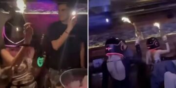 Un vídeo espeluznante de un bar suizo muestra al personal cargando botellas de champán en llamas antes de un infierno mortal que mató al menos a 47 personas.