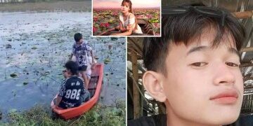 Momento en que papá héroe se sumerge en un lago helado para salvar al hijo de un extraño después de que el niño se hundiera en el hielo mientras jugaba con sus amigos.